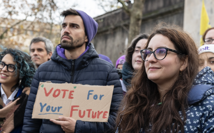 Duarte Costa, Lead Candidate for the European elections in Portugal in 2024, holds a sign with the text